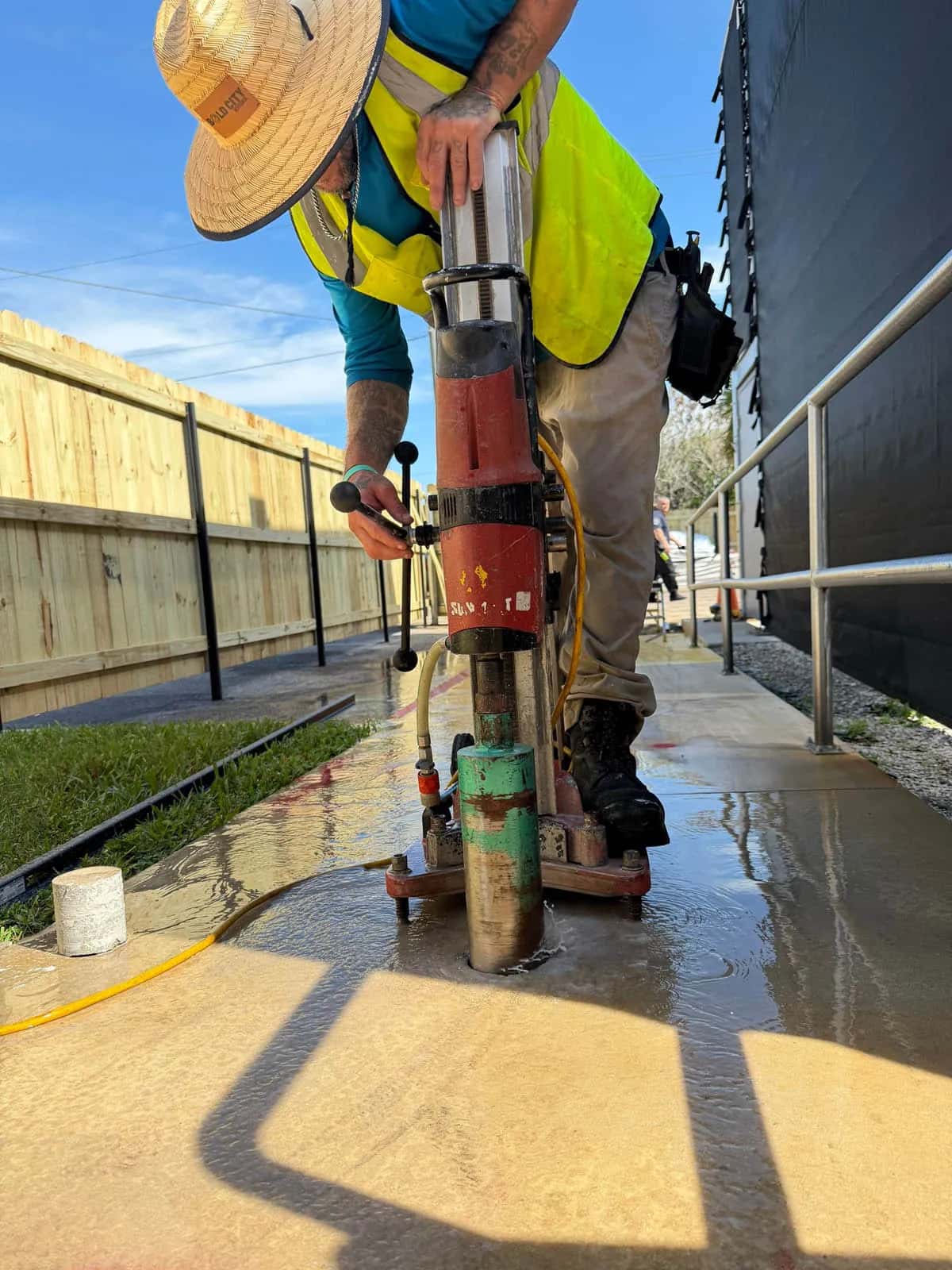 Swi Fence Florida Crew Core Drilling Through Concrete For Fence