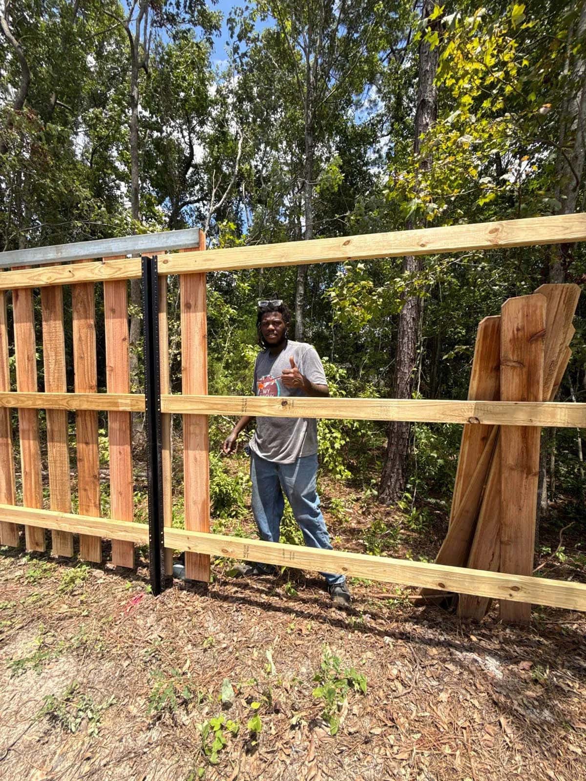 Swi Fence Florida Crew Member Installing Wood Privacy Fence