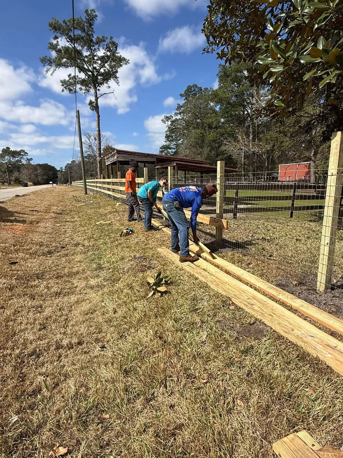 S Wui Fence Florida Crew Installing Three Rail Farm Fence With No Climb Wire 2