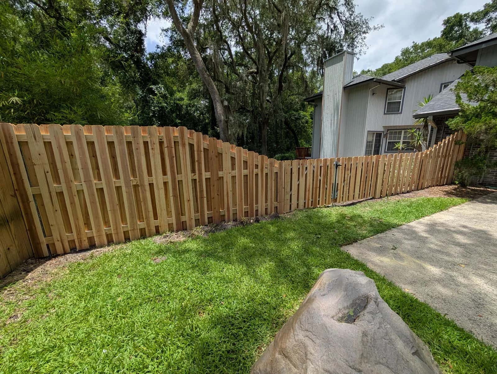 Florida Wood Cedar Shadowbox Privacy Fence With Transition From 8 Foot To 4 Foot With Double Gate